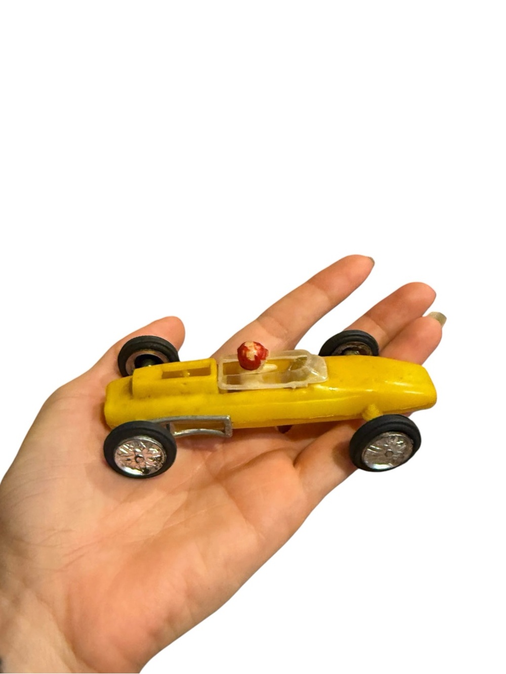 Vintage plastic yellow race car toy